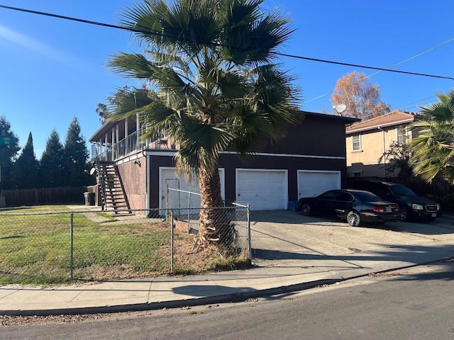 view of front of property featuring a garage