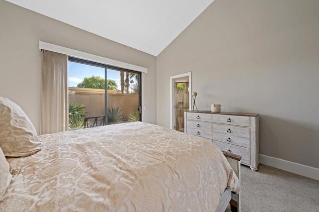 carpeted bedroom featuring access to exterior and high vaulted ceiling