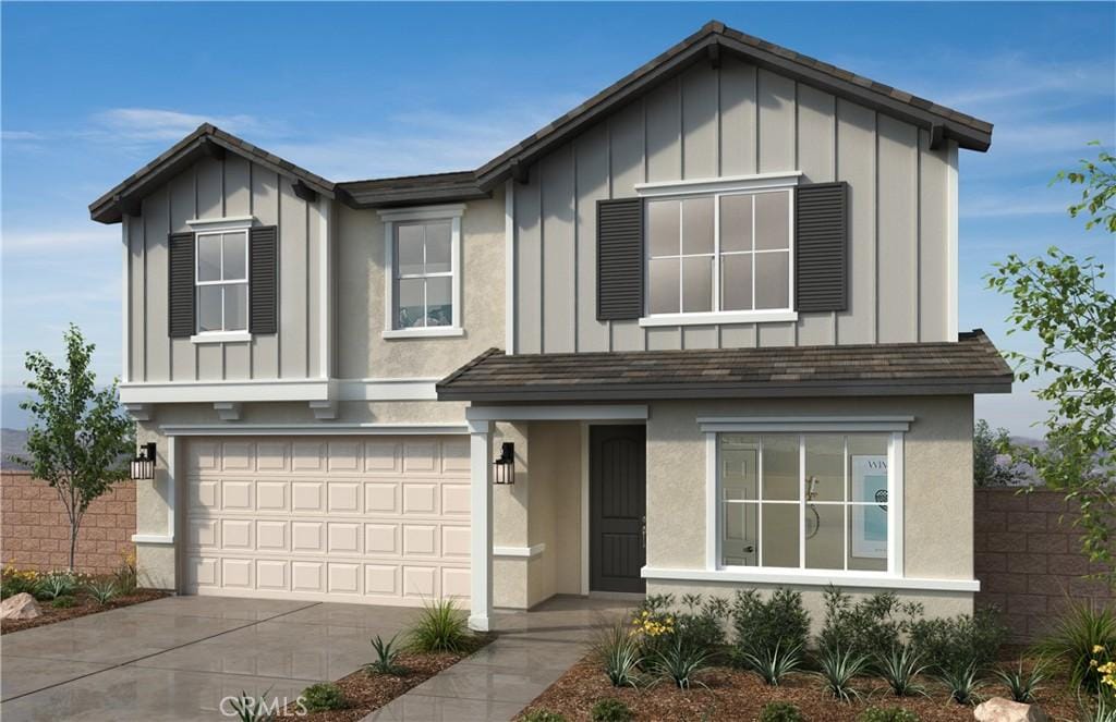 view of front of home with a garage