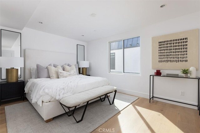 bedroom featuring hardwood / wood-style flooring