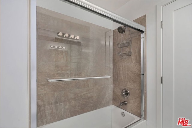 bathroom featuring enclosed tub / shower combo