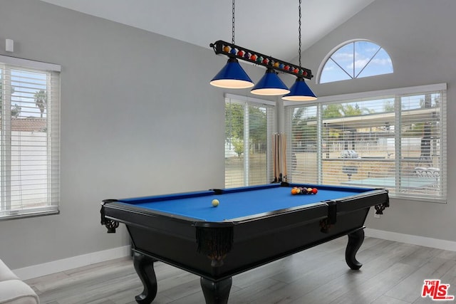 rec room with hardwood / wood-style flooring, high vaulted ceiling, and pool table