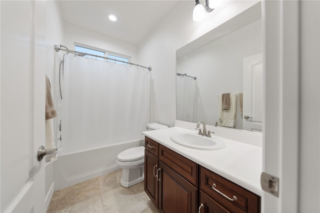 full bathroom with vanity, shower / bath combination with curtain, and toilet