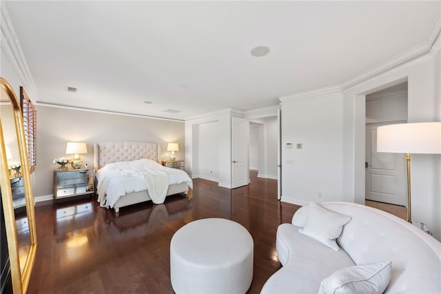 bedroom featuring dark hardwood / wood-style floors and ornamental molding