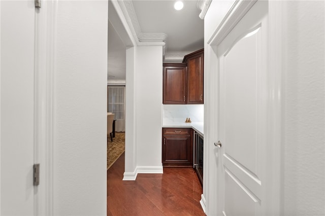 hallway with dark hardwood / wood-style floors