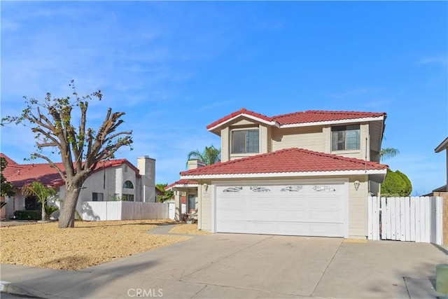 mediterranean / spanish-style home featuring a garage