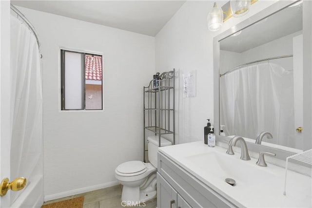 full bathroom with tile patterned flooring, vanity, toilet, and shower / bath combo with shower curtain