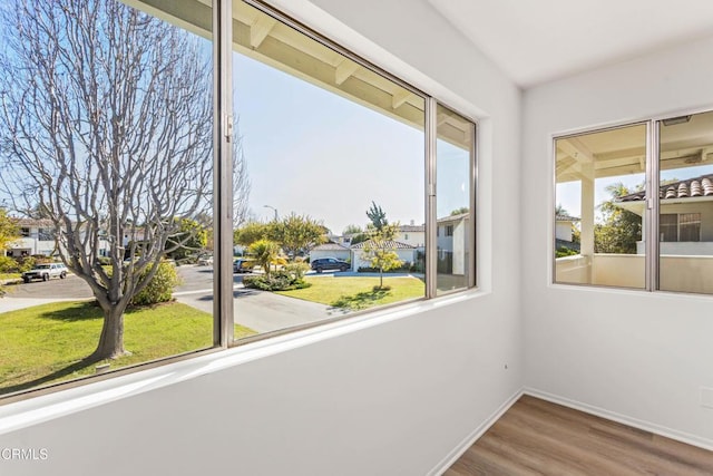 unfurnished sunroom featuring a healthy amount of sunlight