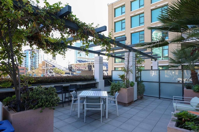 view of patio featuring a bar