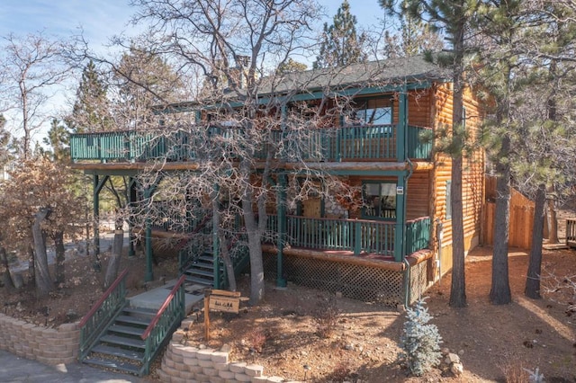 rear view of house with a deck