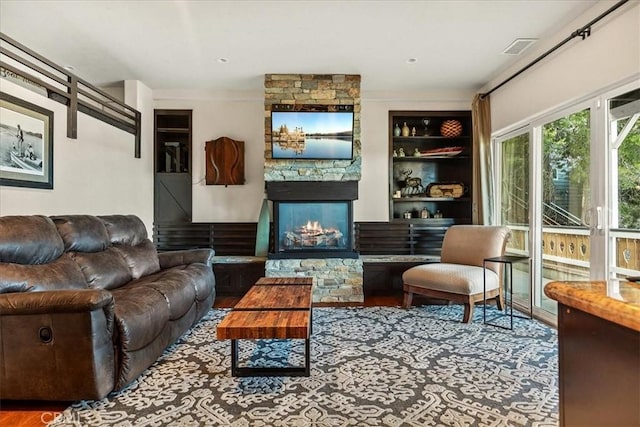 28906 Palisades Dr, Lake Arrowhead, CA 92352 - living area featuring visible vents and a fireplace