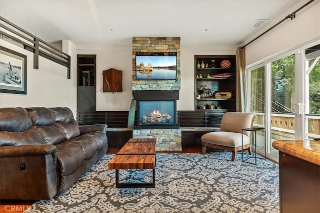 28906 Palisades Dr, Lake Arrowhead, CA 92352 - living room featuring a fireplace and built in features