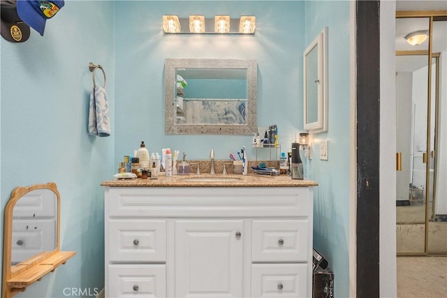 bathroom featuring vanity and walk in shower