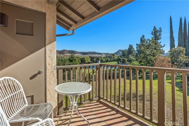 balcony featuring a mountain view