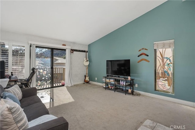 living room with light carpet and vaulted ceiling