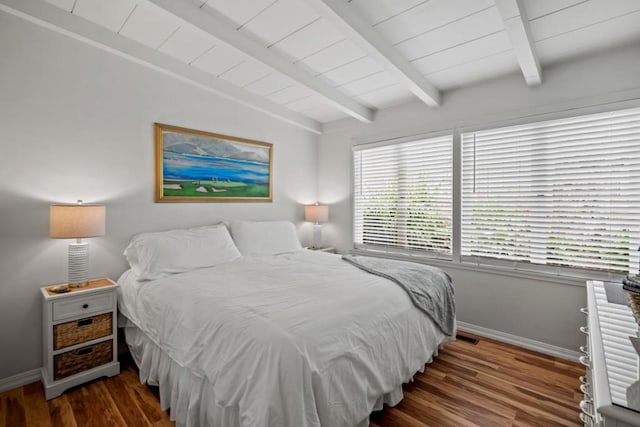 bedroom with wood ceiling, lofted ceiling with beams, and dark hardwood / wood-style floors