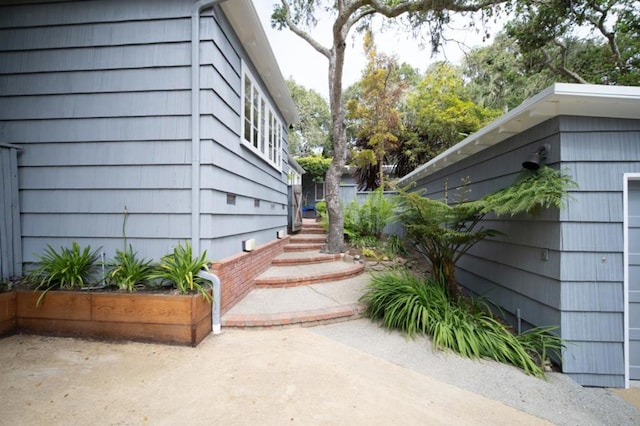 view of home's exterior with a patio