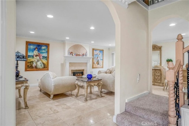 living room with ornamental molding