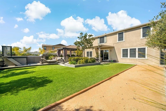 back of property featuring a lawn, a patio area, and a gazebo