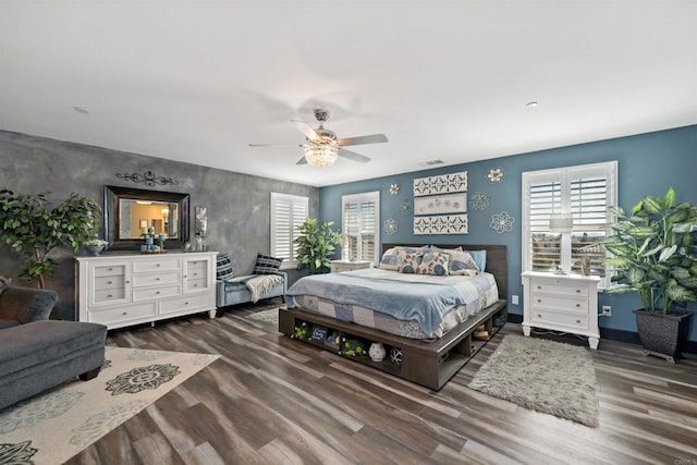 bedroom featuring ceiling fan and wood-type flooring