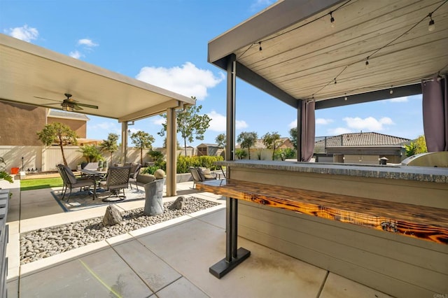 view of patio with ceiling fan