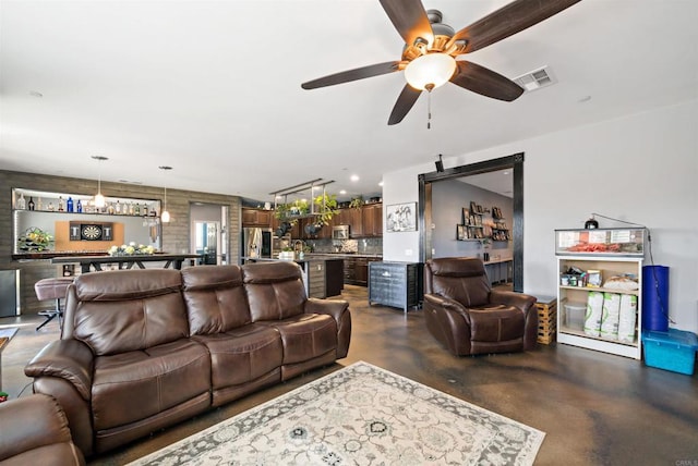 30343 Mahogany St, Murrieta, CA 92563 - living room with visible vents, ceiling fan, and concrete flooring