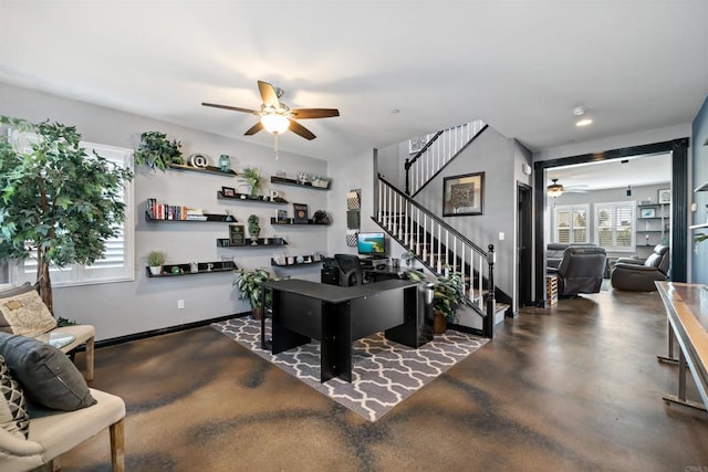 30343 Mahogany St, Murrieta, CA 92563 - living area with baseboards, stairway, ceiling fan, and finished concrete flooring