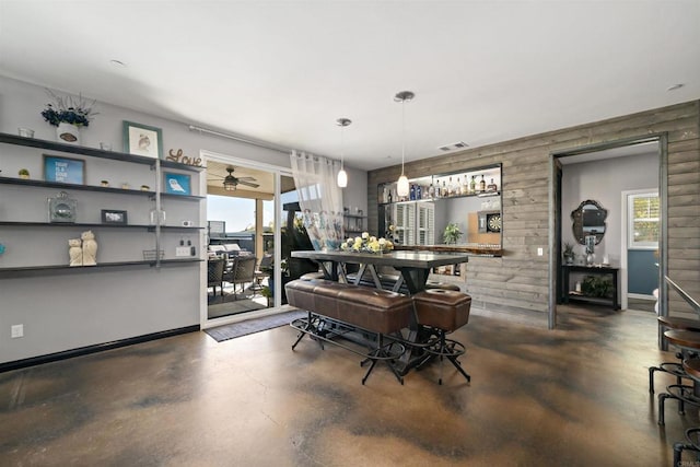 30343 Mahogany St, Murrieta, CA 92563 - dining area featuring finished concrete flooring, visible vents, ceiling fan, and baseboards