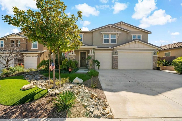 30343 Mahogany St, Murrieta, CA 92563 - view of front of property with concrete driveway, stone siding, stucco siding, and a garage