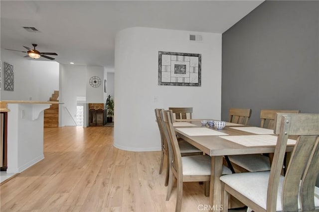 dining room featuring ceiling fan and light wood-type flooring