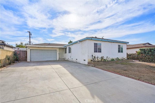 single story home with a garage