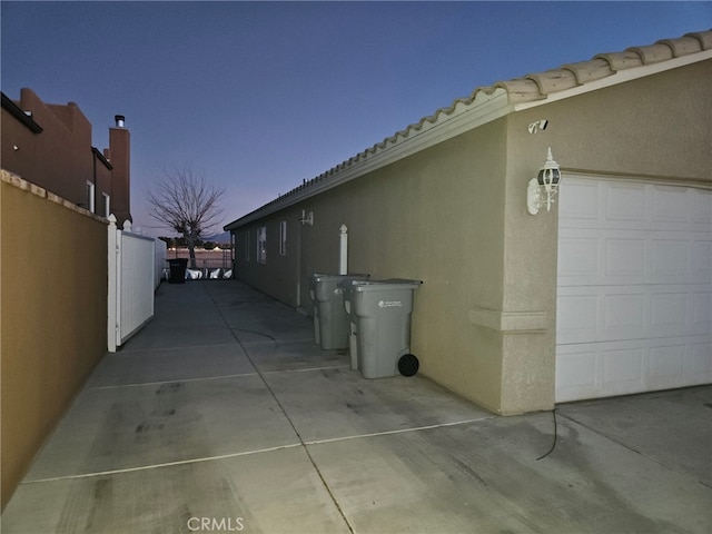 view of property exterior at dusk