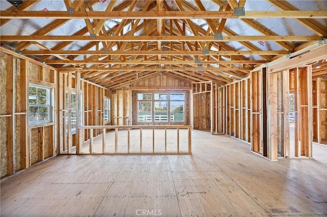 miscellaneous room featuring lofted ceiling