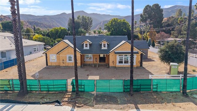 view of front of house with a mountain view