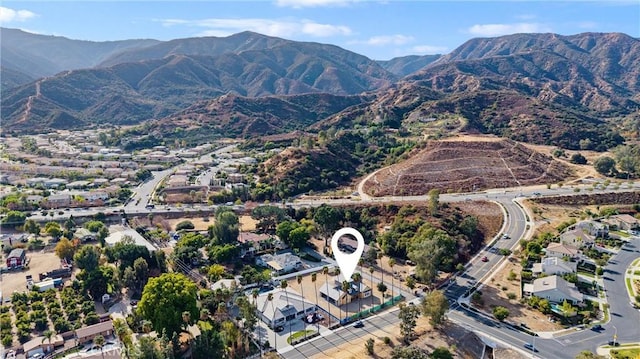 drone / aerial view featuring a mountain view