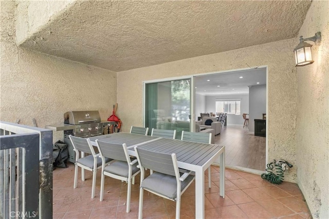 view of patio / terrace with a balcony