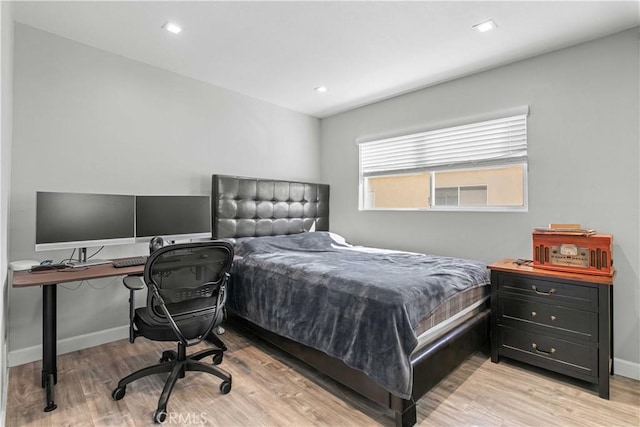 bedroom with light hardwood / wood-style flooring