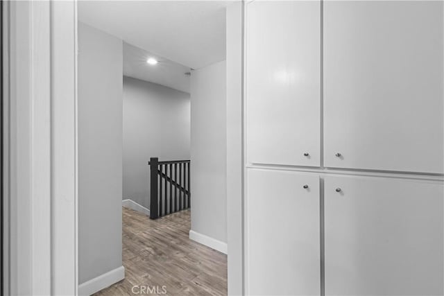 hallway featuring light hardwood / wood-style flooring