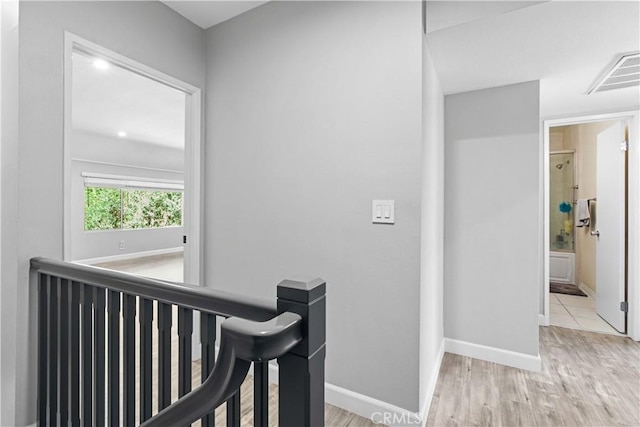 hallway featuring light hardwood / wood-style floors