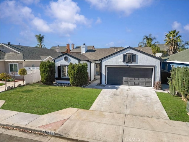 ranch-style house with a garage and a front yard