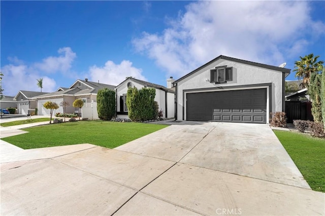 ranch-style house featuring a garage and a front lawn