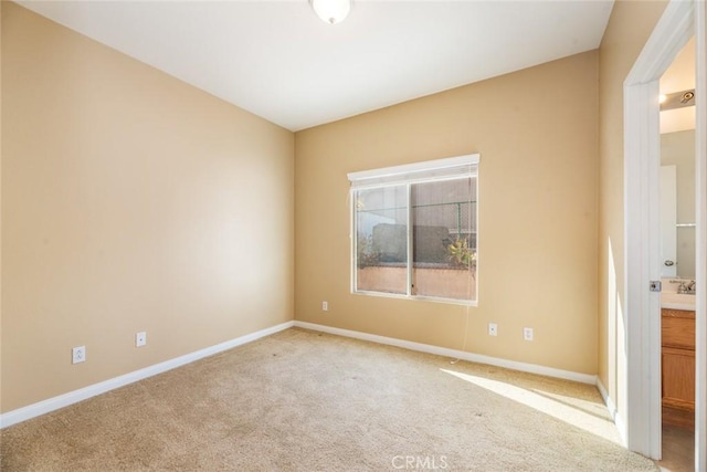 view of carpeted spare room