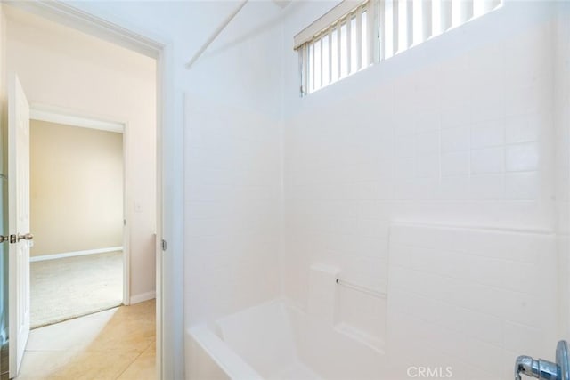 bathroom with tile patterned flooring and shower / bathing tub combination