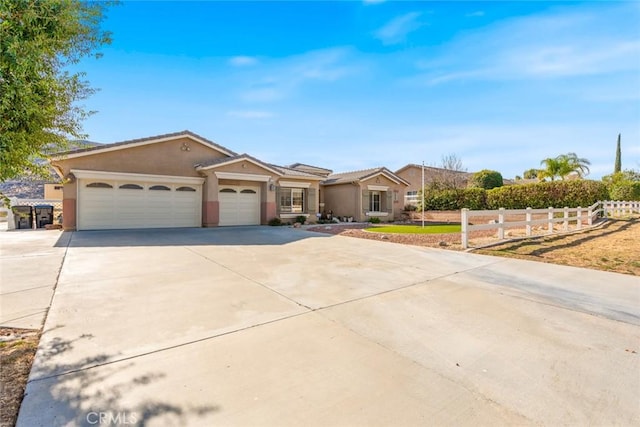 single story home with a garage