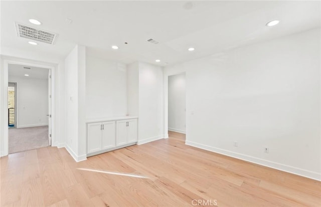 21235 Wildflower Way, Chatsworth, CA 91311 - empty room with light wood-style floors and recessed lighting