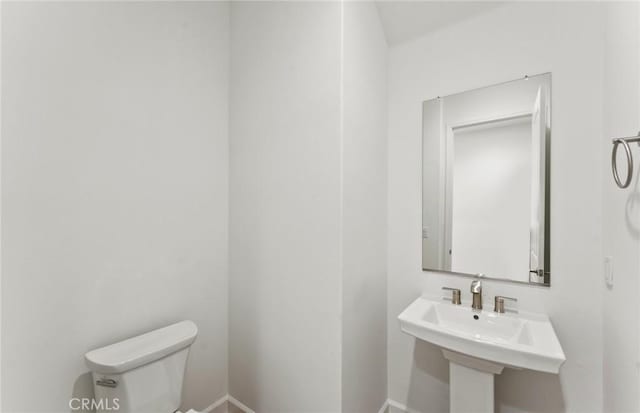 21235 Wildflower Way, Chatsworth, CA 91311 - half bath with toilet and baseboards