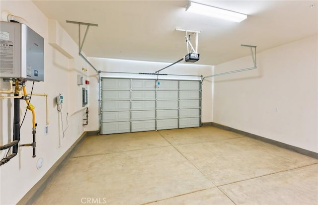 21235 Wildflower Way, Chatsworth, CA 91311 - garage featuring tankless water heater and a garage door opener