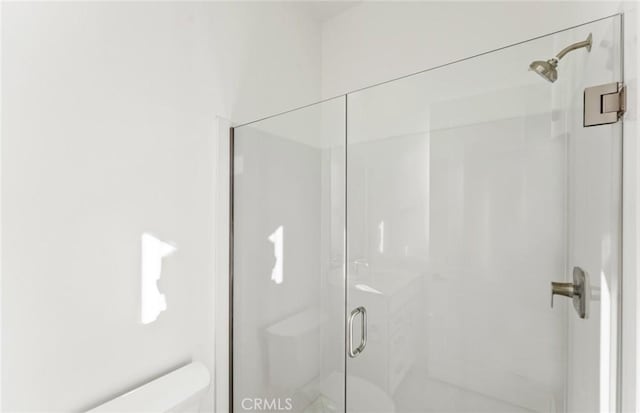 21235 Wildflower Way, Chatsworth, CA 91311 - bathroom featuring toilet and a shower stall