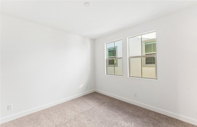 21235 Wildflower Way, Chatsworth, CA 91311 - carpeted empty room with baseboards