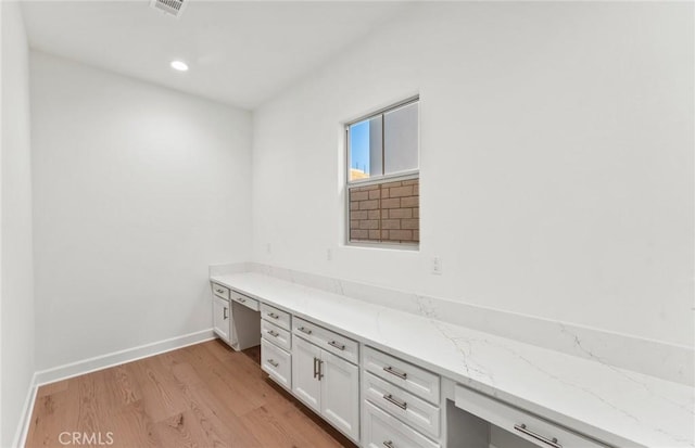 21235 Wildflower Way, Chatsworth, CA 91311 - unfurnished office with built in study area, light wood-style floors, and recessed lighting